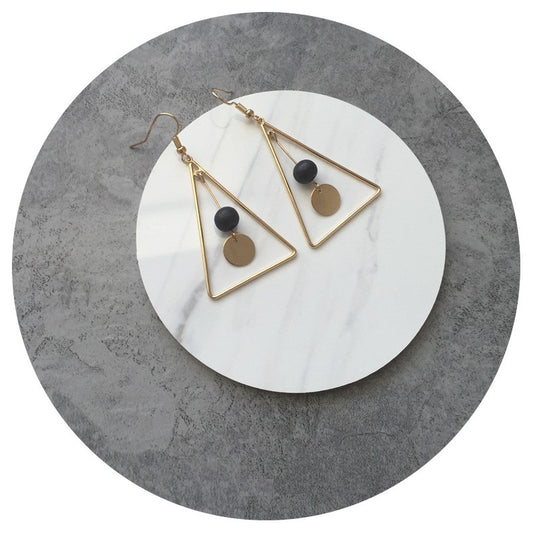 Dynamic Triangle Earrings adorned With Wood Disk and Bead